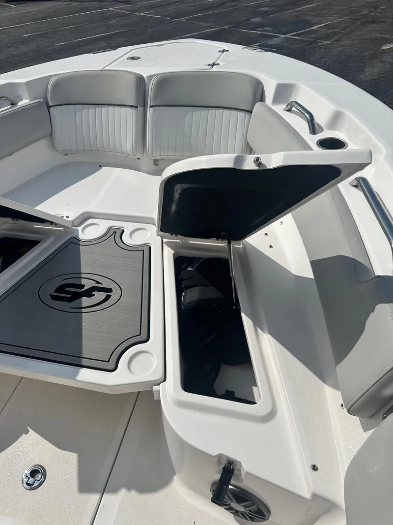 Slide: The Image of 2022 Sea Fox 248 Commander boat interior with open storage compartments. - 27