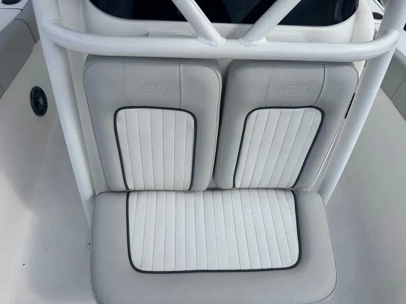 Slide: The Image of 2022 Sea Fox 248 Commander boat seating, white and gray upholstery, close-up view. - 30