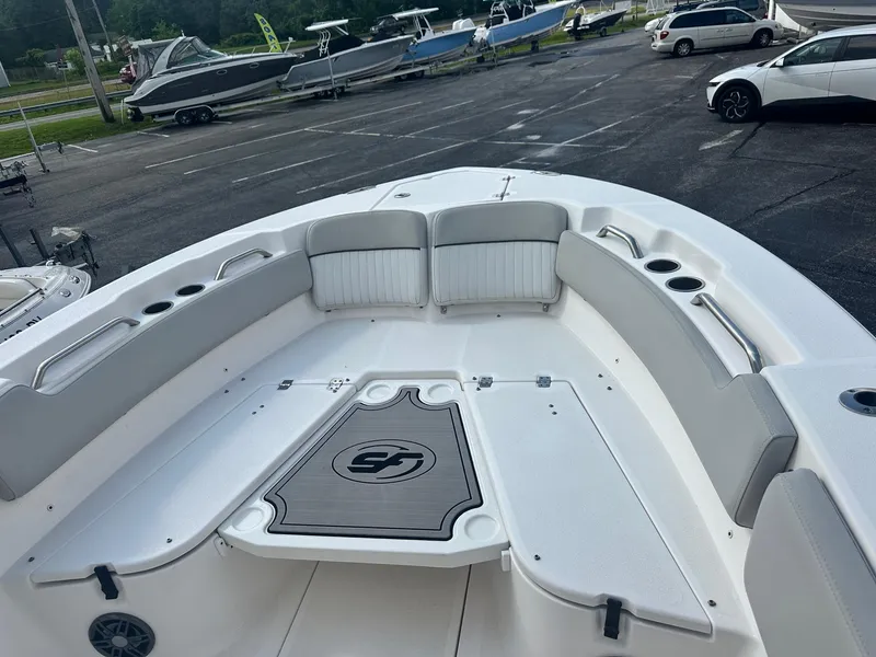 Slide: The Image of 2022 Sea Fox 248 Commander boat interior with cushioned seating and storage compartments. - 31