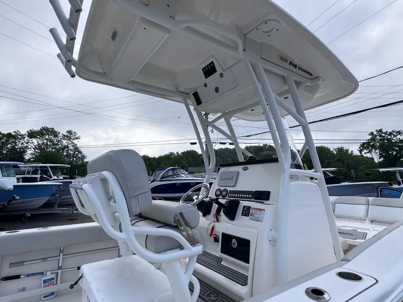 Slide: The Image of 2022 Sea Fox 248 Commander boat interior with helm and seating, showcasing modern design. - 36