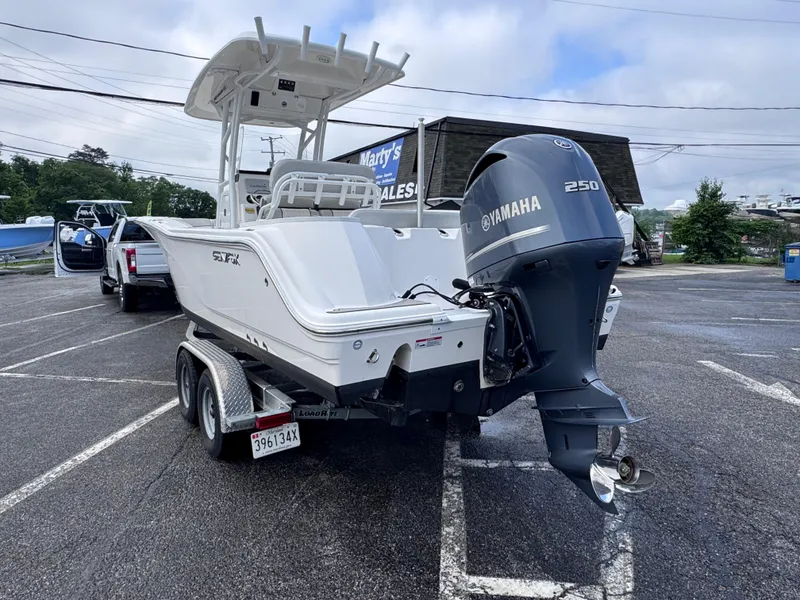 Slide: The Image of 2022 Sea Fox 248 Commander boat with Yamaha 250 engine on trailer in parking lot. - 4