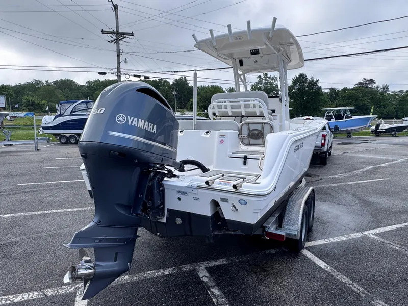 Slide: The Image of 2022 Sea Fox 248 Commander boat with Yamaha engine on trailer in parking lot. - 6