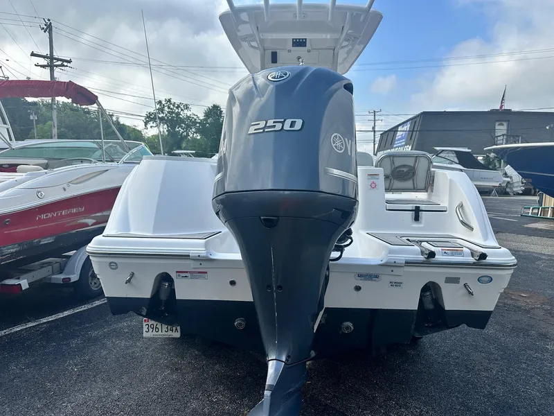 Slide: The Image of 2022 Sea Fox 248 Commander boat with Yamaha 250 engine, parked in a marina. - 8