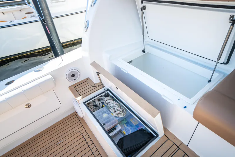 Slide: The Image of 2025 Henriques 50 Sportfisherman storage compartments on deck. - 19