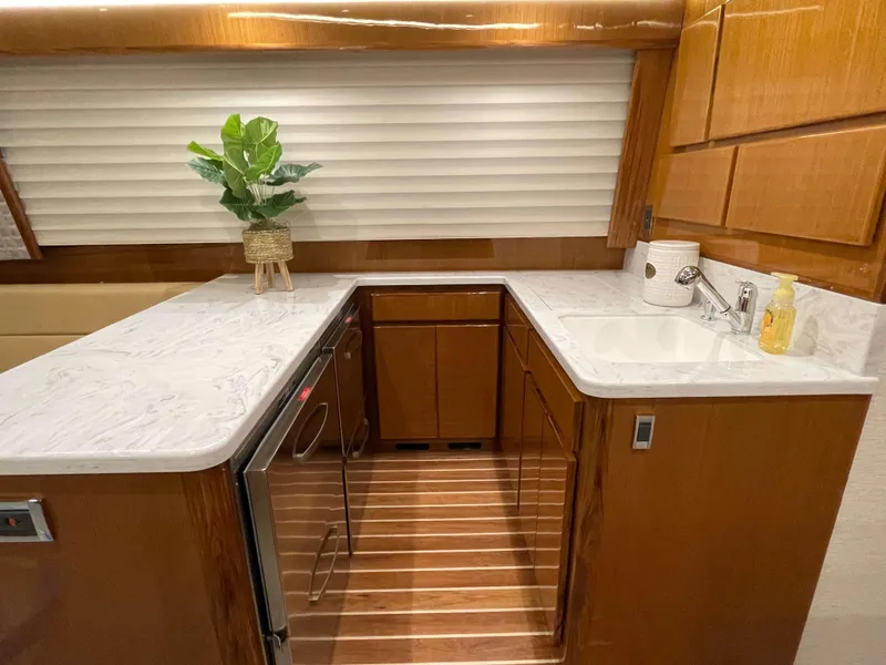 Slide: The Image of Modern kitchen area in 2025 Henriques 50 Sportfisherman yacht with marble countertops. - 29
