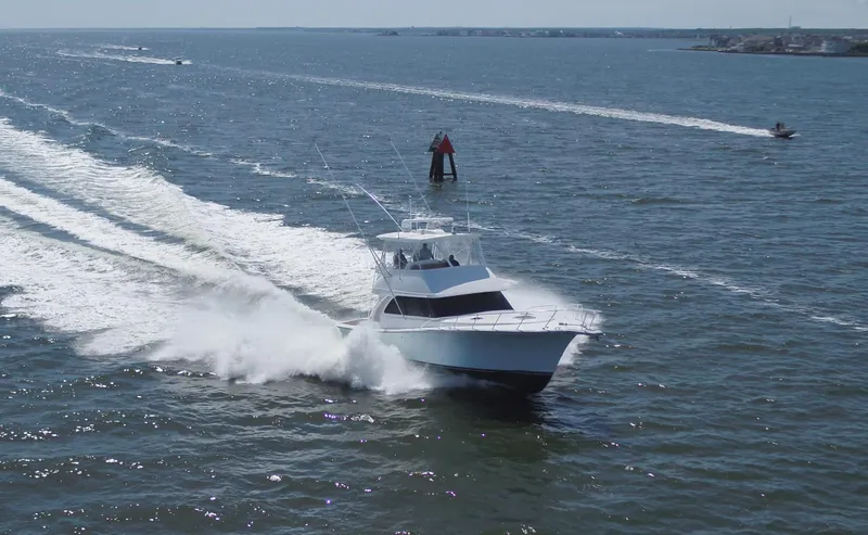 Slide: The Image of 2025 Henriques 50 Sportfisherman cruising on open water. - 3