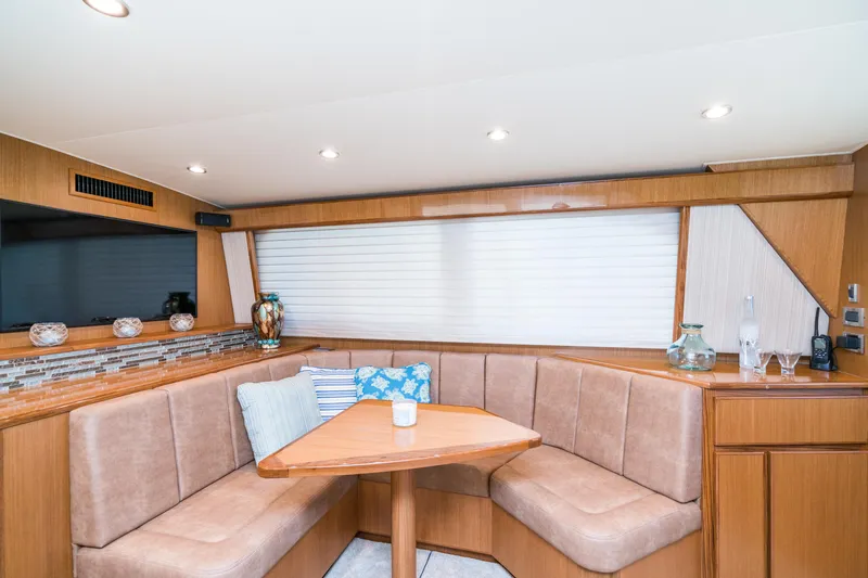 Slide: The Image of Interior of 2025 Henriques 50 Sportfisherman with cozy dining area and modern decor. - 8