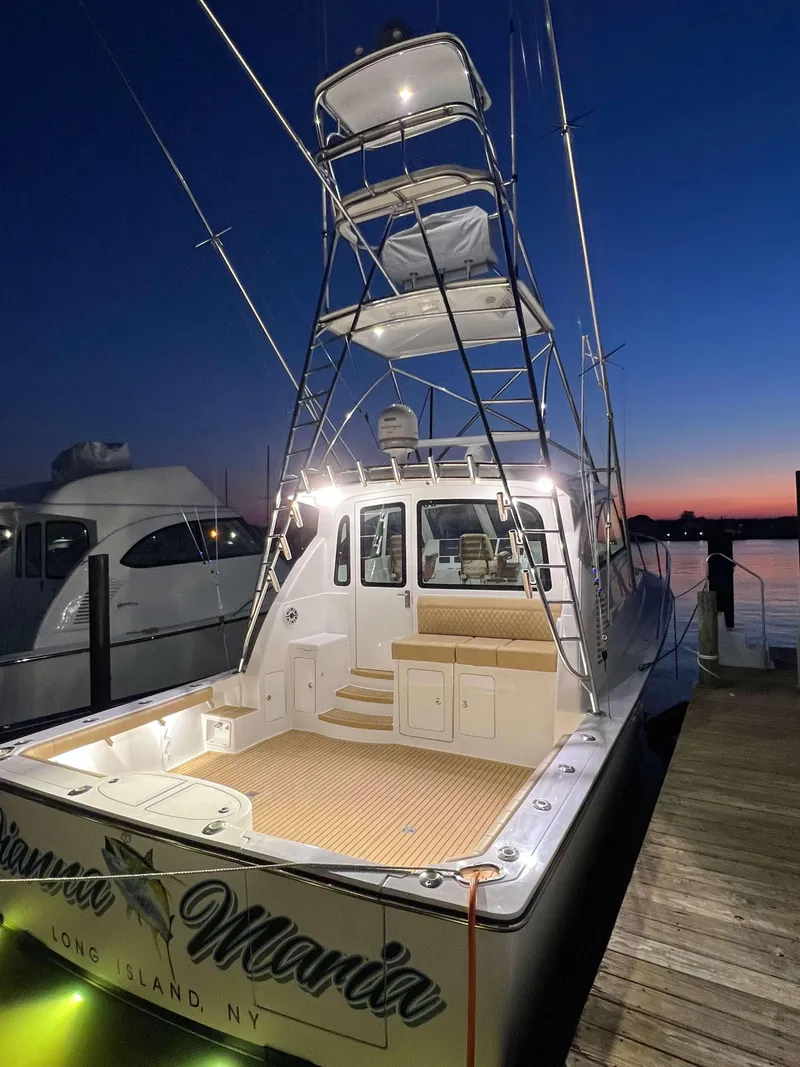 Slide: The Image of 2025 Henriques 42 Express boat docked at sunset in Long Island, NY. - 6