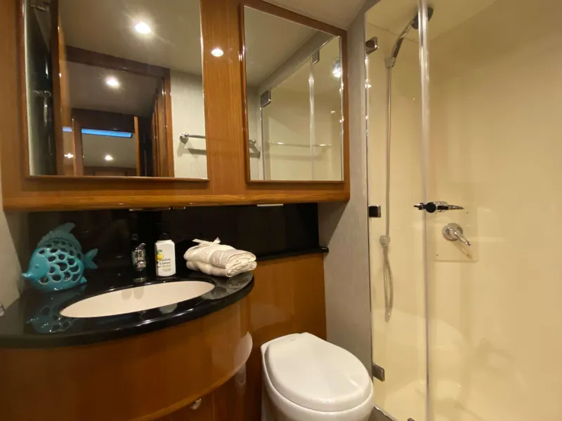 Slide: The Image of Modern bathroom in 2025 Henriques 42 EXHTB yacht with shower, sink, and toilet. - 25