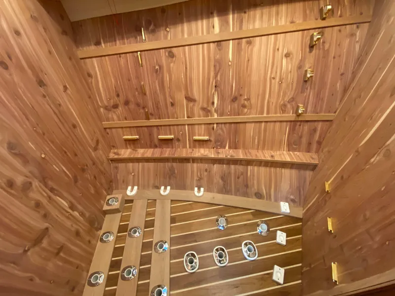 Slide: The Image of Henriques 42 EXHTB 2025 model, wooden interior with fishing rod holders and deck fittings. - 27