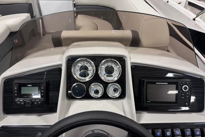 Slide: The Image of Dashboard of 2026 Sylvan Mirage 818 Cruise boat with gauges and navigation system. - 12