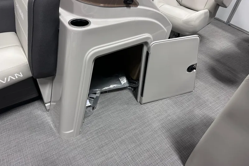 Slide: The Image of Open storage compartment on 2026 Sylvan Mirage 818 Cruise boat interior. - 17