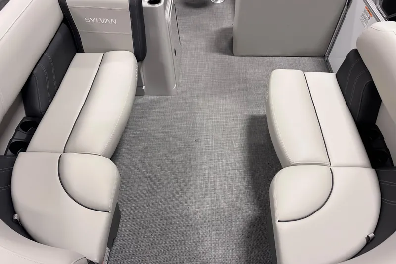 Slide: The Image of 2026 Sylvan Mirage 818 Cruise interior with plush seating and modern design. - 18