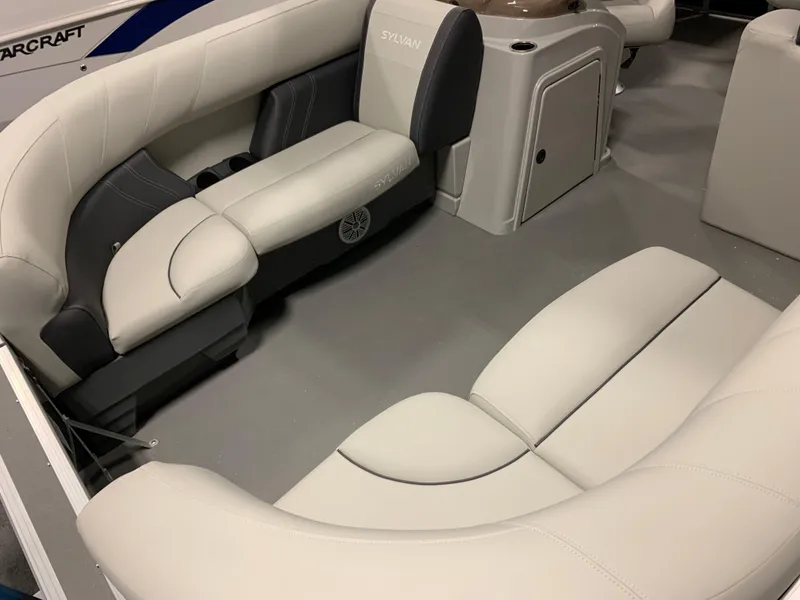 Slide: The Image of Interior of 2026 Sylvan Mirage 818 Cruise with beige seating. - 6