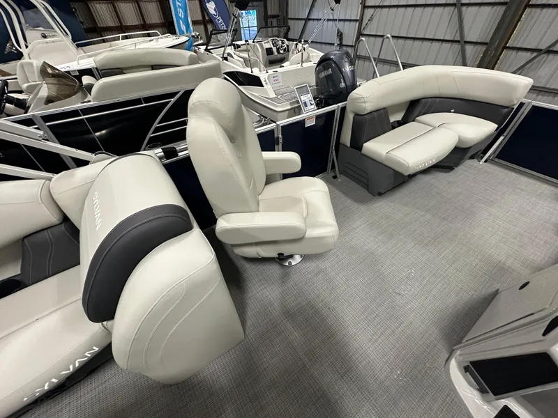 Slide: The Image of 2026 Sylvan Mirage 8520 LZ pontoon boat interior with plush seating and modern design. - 12