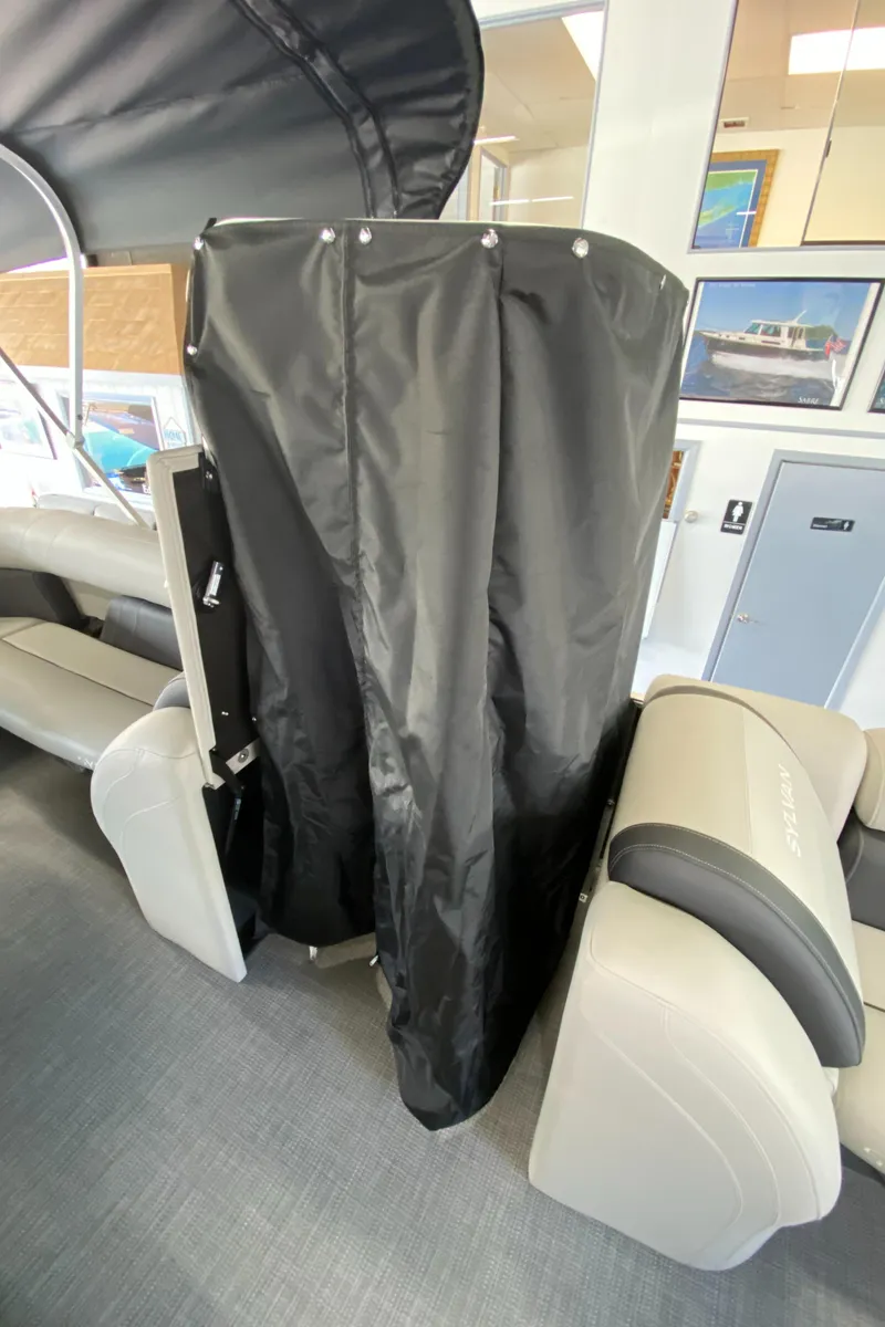 Slide: The Image of 2022 Sylvan Mirage 8522 Cruise boat interior with privacy curtain. - 11