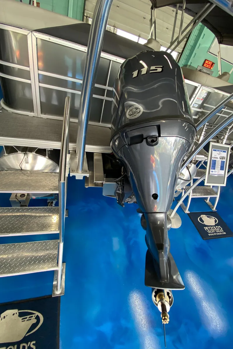 Slide: The Image of 2022 Sylvan Mirage 8522 Cruise boat engine in showroom. - 12