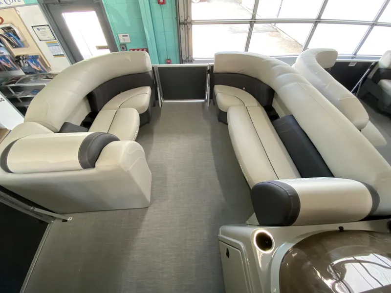 Slide: The Image of 2022 Sylvan Mirage 8522 Cruise interior with spacious seating and modern design. - 4