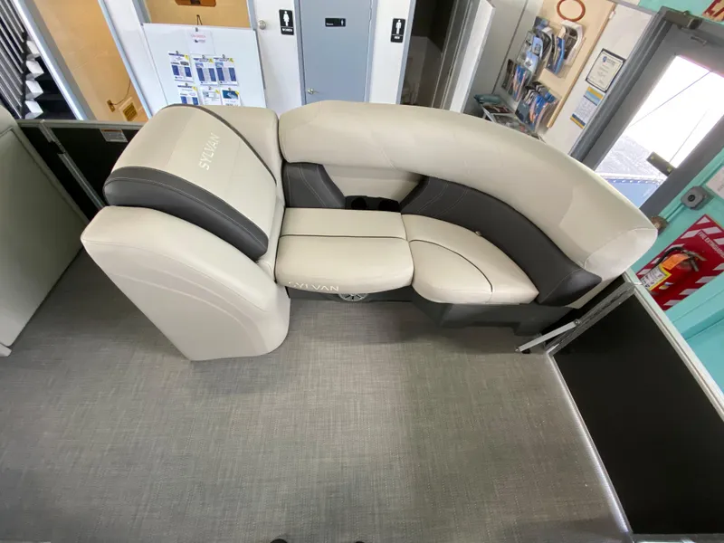 Slide: The Image of 2022 Sylvan Mirage 8522 Cruise boat interior with plush seating. - 5