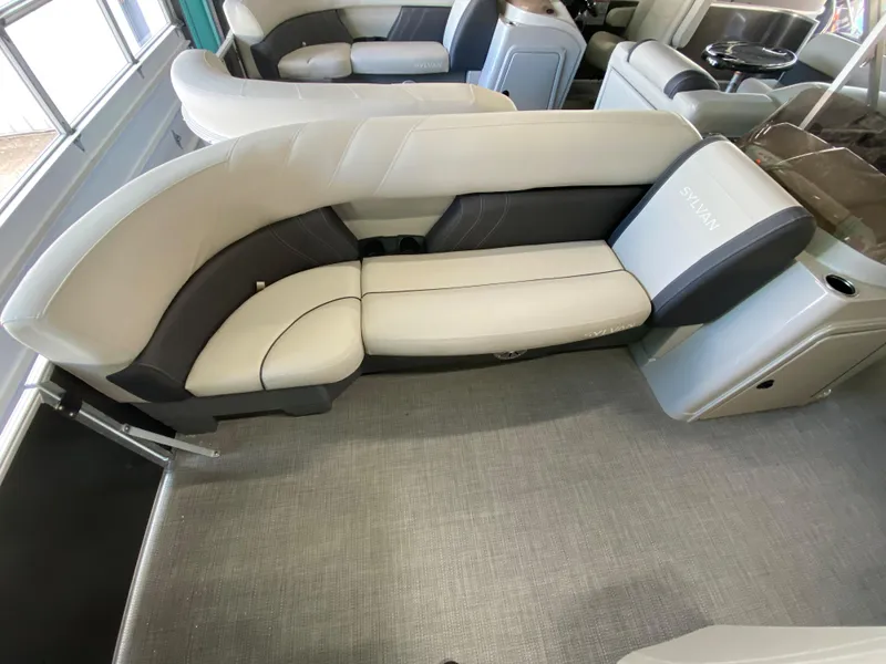 Slide: The Image of 2022 Sylvan Mirage 8522 Cruise boat interior with plush seating. - 6