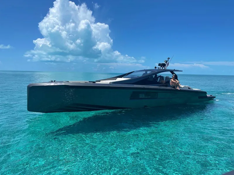 Slide: The Image of Luxury Maori 54 yacht cruising in clear turquoise waters, 2020 model. - 0