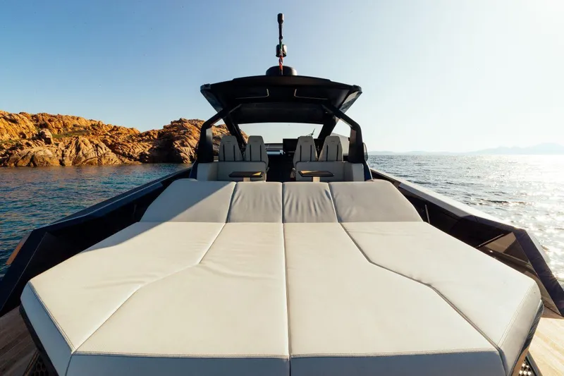 Slide: The Image of Luxury Maori 54 yacht, 2020 model, with spacious sunbed and scenic ocean view. - 13