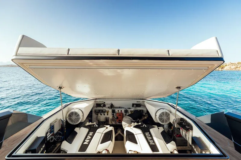 Slide: The Image of Maori 54 yacht engine compartment with open hatch, 2020 model, ocean background. - 14