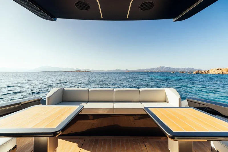Slide: The Image of Luxury seating area on a 2020 Maori 54 yacht with ocean view. - 15