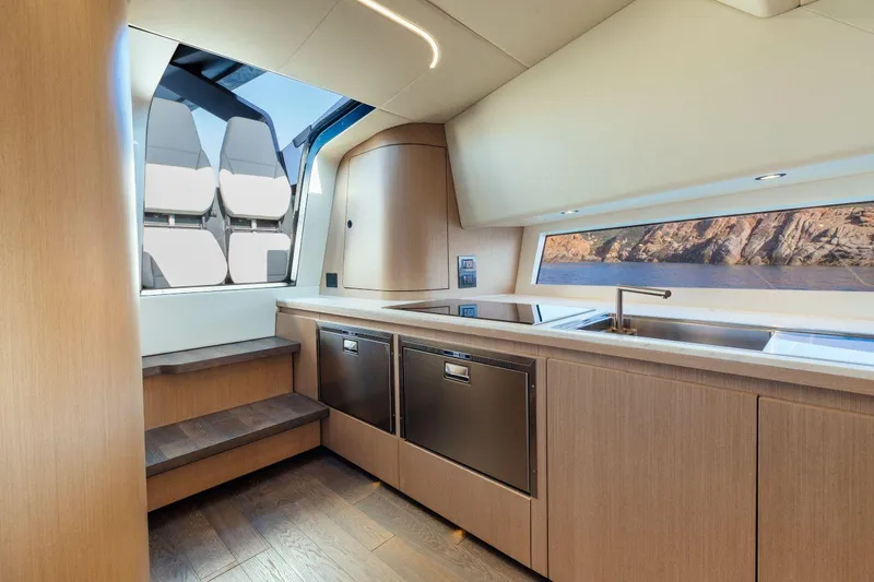 Slide: The Image of Modern kitchen interior of 2020 Maori 54 yacht with sleek design and ocean view. - 20