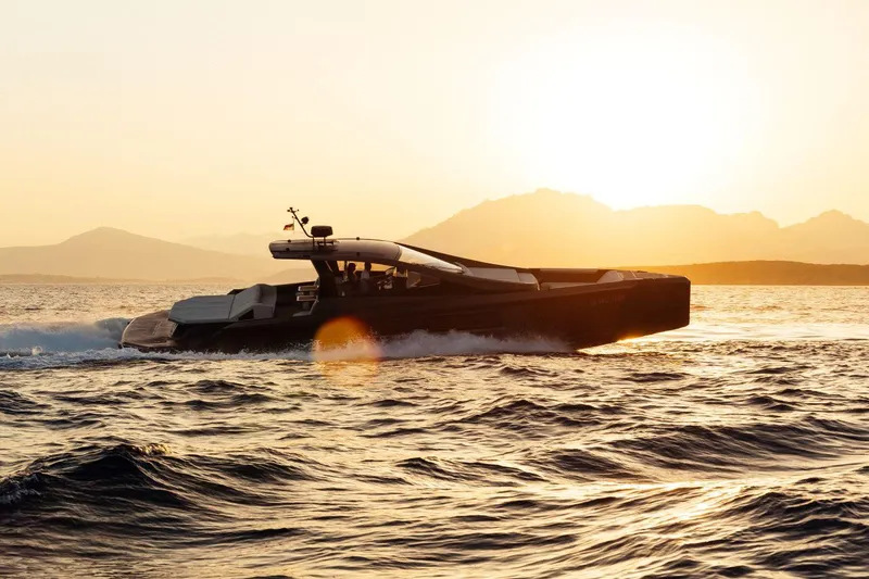 Slide: The Image of Luxury Maori 54 yacht cruising at sunset, 2020 model. - 24