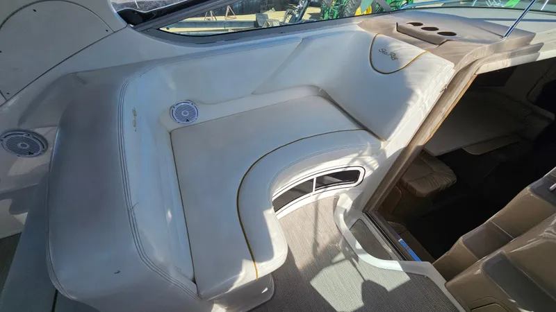 Slide: The Image of Interior seating area of a 2003 Sea Ray 280 Sundancer boat. - 10