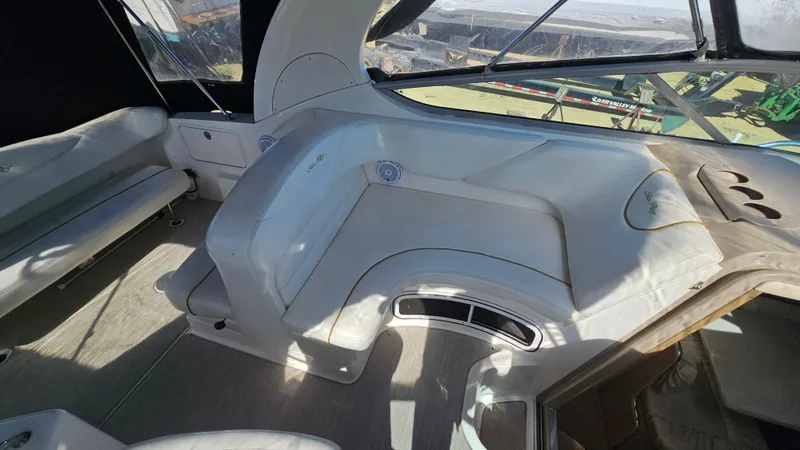 Slide: The Image of Interior seating area of 2003 Sea Ray 280 Sundancer boat. - 7