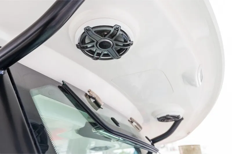 Slide: The Image of 2023 Boston Whaler 360 Outrage boat speakers and windshield detail. - 18