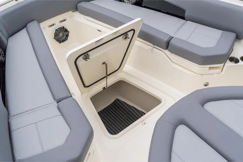 Slide: The Image of 2023 Boston Whaler 360 Outrage boat interior with open storage compartment. - 30