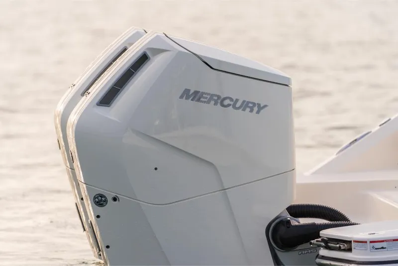 Slide: The Image of 2023 Boston Whaler 360 Outrage with twin Mercury outboard engines. - 33