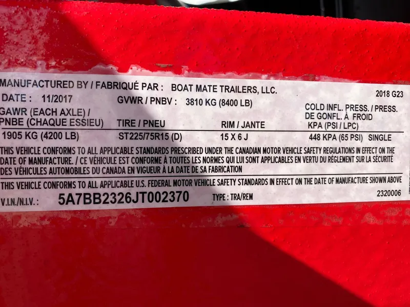 Slide: The Image of 2018 Nautique G23 trailer label with specifications and compliance details. - 39