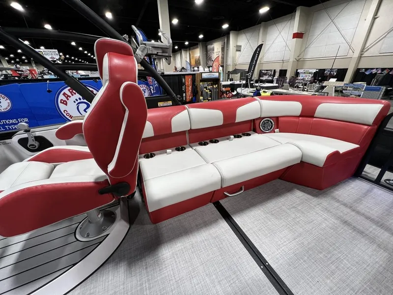 Slide: The Image of 2022 Montara SURF BOSS 23 boat interior with red and white seating. - 17