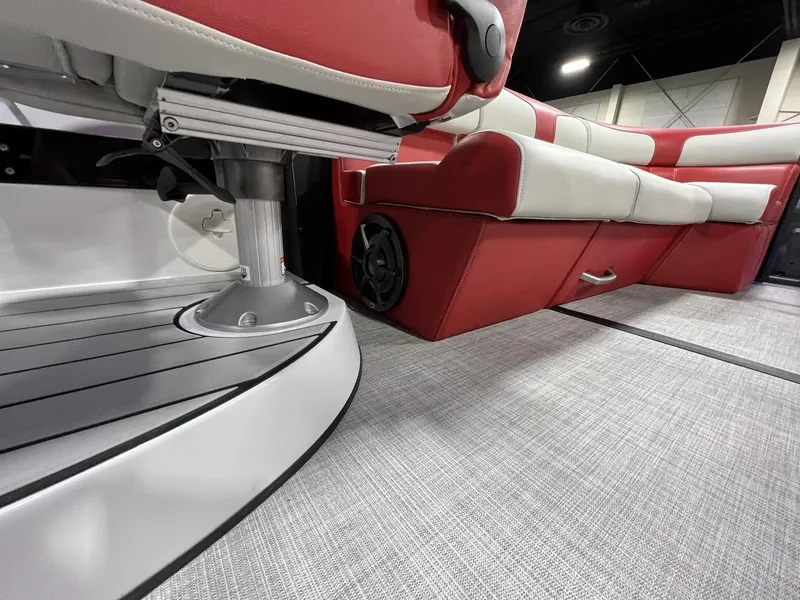 Slide: The Image of Interior of 2022 Montara SURF BOSS 23 boat with red and white seating. - 21