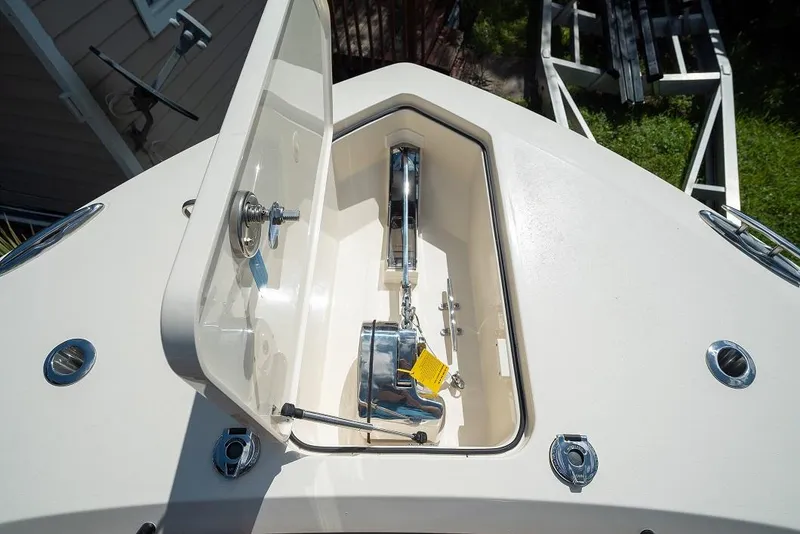 Slide: The Image of Anchor storage compartment on 2025 Scout 330 LXF boat. - 33
