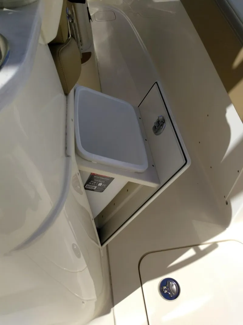 Slide: The Image of 2025 Scout 277 LXF boat with built-in storage compartment. - 15