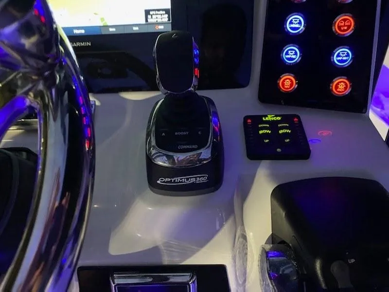 Slide: The Image of 2020 Robalo 302 boat dashboard with Optimus 360 joystick and control panel. - 1