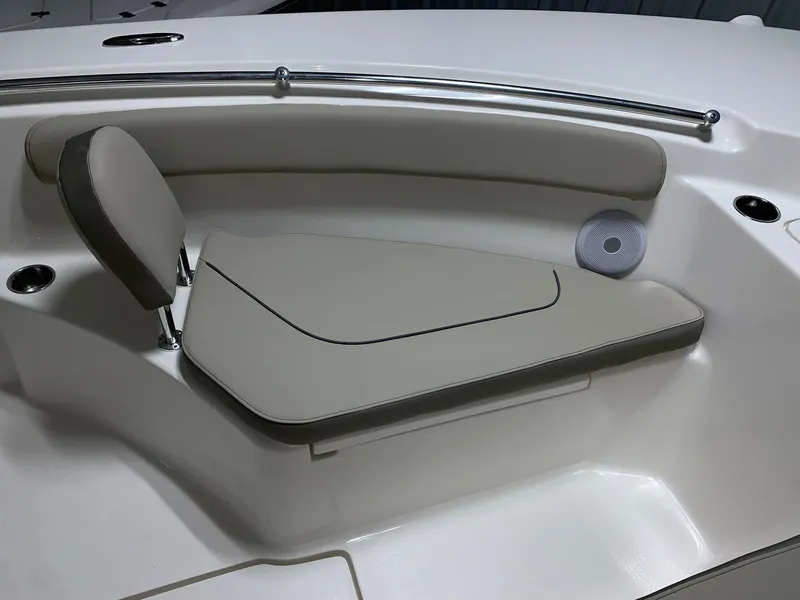 Slide: The Image of 2024 Key West 244 Center Console boat seating area with cushioned backrest. - 17