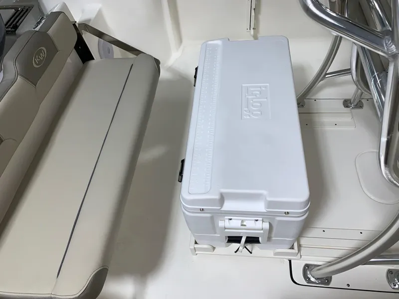 Slide: The Image of 2024 Key West 244 Center Console interior with seating and cooler. - 8