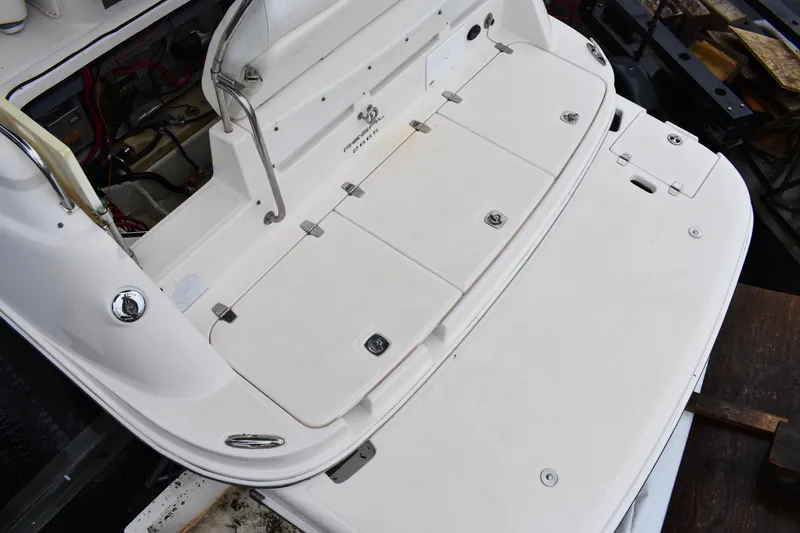 Slide: The Image of 2005 Regal Commodore 2665 boat deck with storage compartments and seating. - 1
