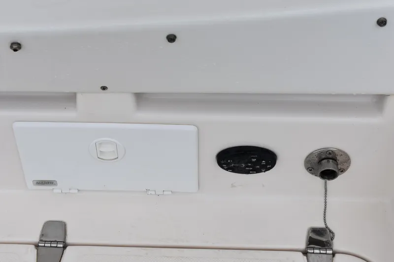 Slide: The Image of 2005 Regal Commodore 2665 boat deck with access panel and fittings. - 7