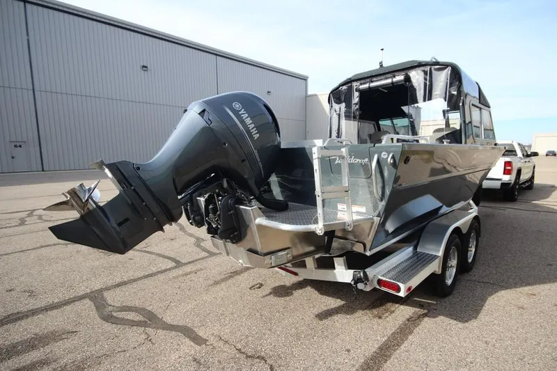 Slide: The Image of 2023 Weldcraft 210 Revolution F200XB boat with Yamaha outboard motor on trailer. - 18