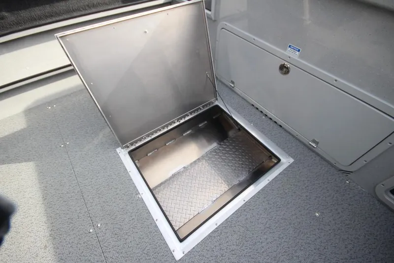 Slide: The Image of 2023 Weldcraft 210 Revolution F200XB boat storage compartment. - 24