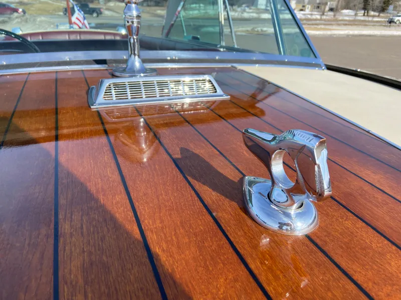 Slide: The Image of 1968 Century Coronado boat with polished wood deck and chrome details. - 7