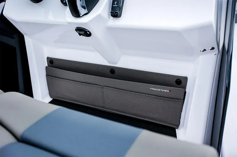 Slide: The Image of 2022 Axopar 22 T-Top boat interior with storage compartment. - 10