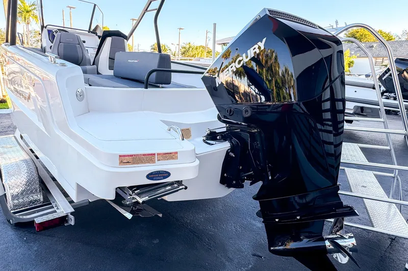 Slide: The Image of 2022 Axopar 22 T-Top boat with Mercury outboard engine on display. - 2
